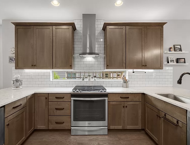 Stainless Steel Appliances, White Backsplash