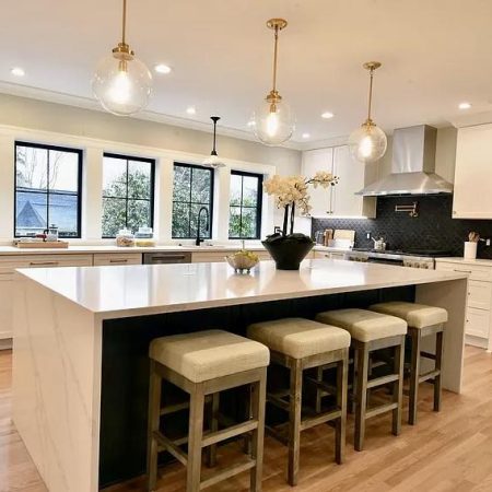 Island-waterfall-countertop-white-quartz-stools.jpg