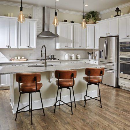 White-Cabinet-with-brown-leather-chairs-scaled.jpg